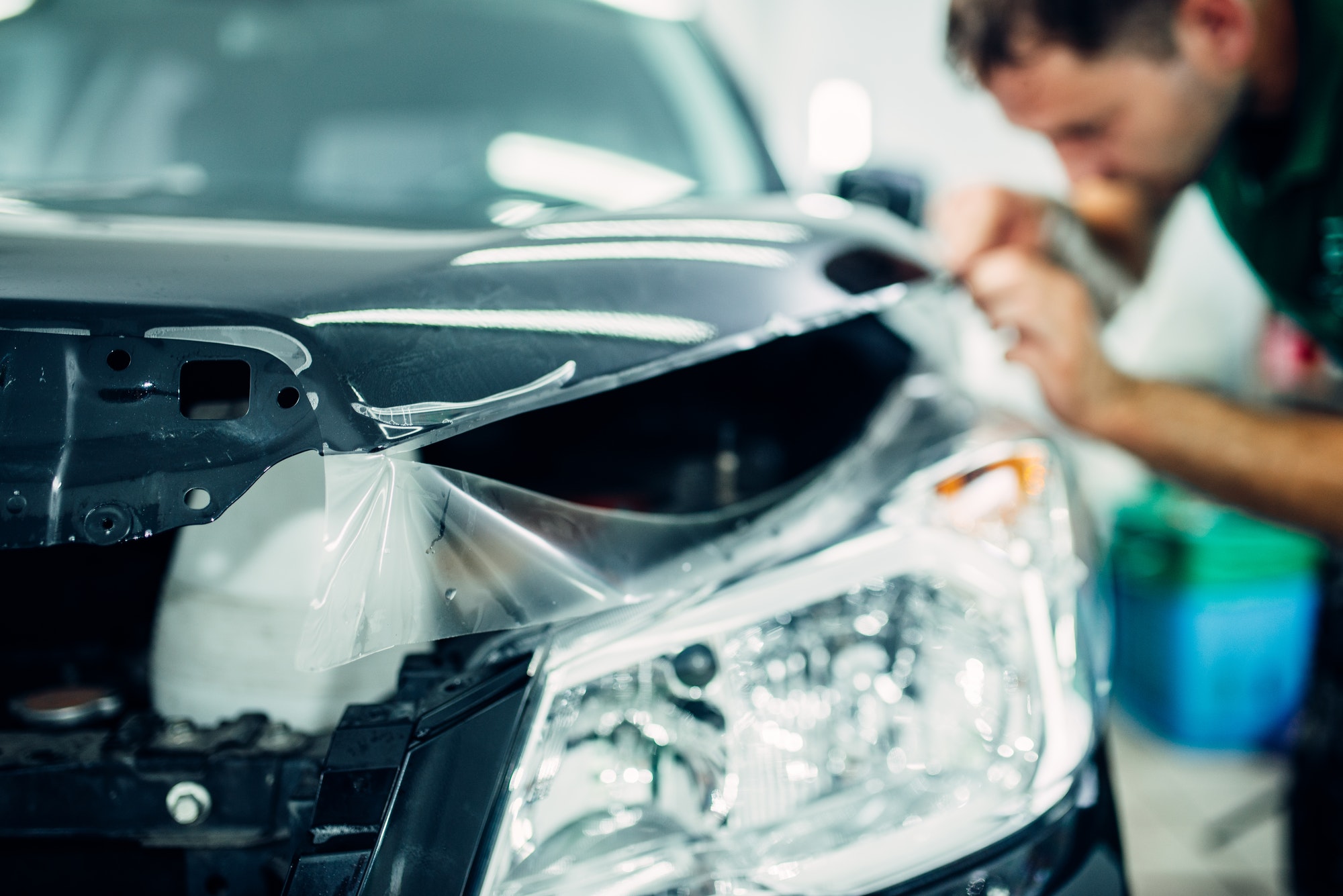 Specialist install car paint protection film
